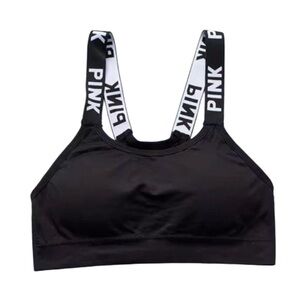 Women's Stretchy Sports Bra. Black with white letters “PINK”